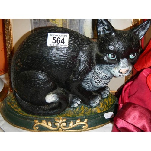 564 - A heavy cast iron cat door stop.