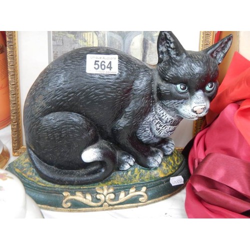 564 - A heavy cast iron cat door stop.