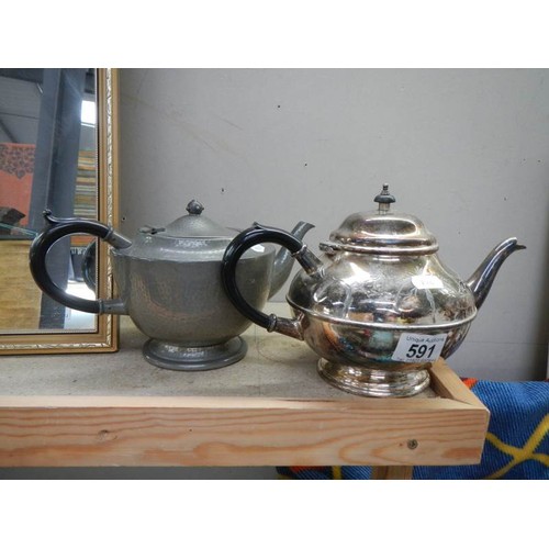 591 - A silver plate and a pewter teapot.