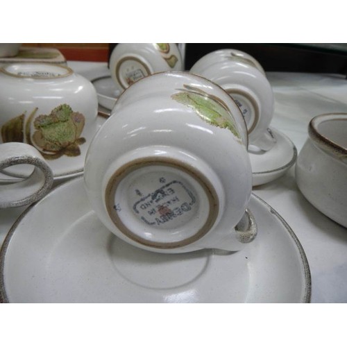 626 - A quantity of Denby cups and saucers.