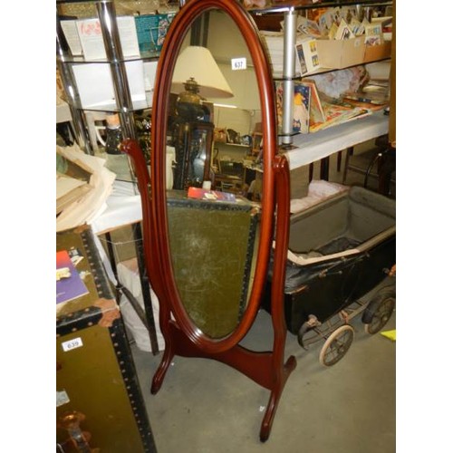 637 - An oval mahogany cheval mirror. COLLECT ONLY.