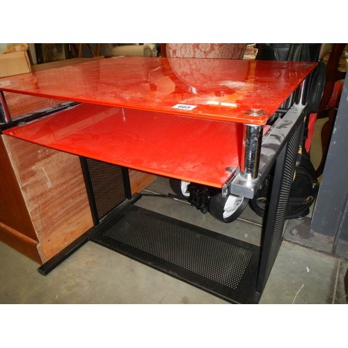 665 - A red glass top office table , COLLECT ONLY.