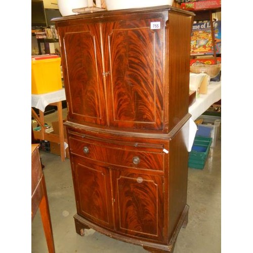 755 - A mahogany two door cabinet with draw slide, COLLECT ONLY.