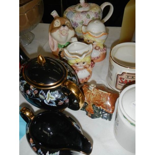 758 - A mixed lot of teapots, bowls etc.,