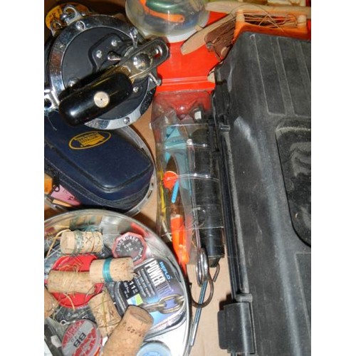 764 - Two boxed of angling items, reels, floats etc.,