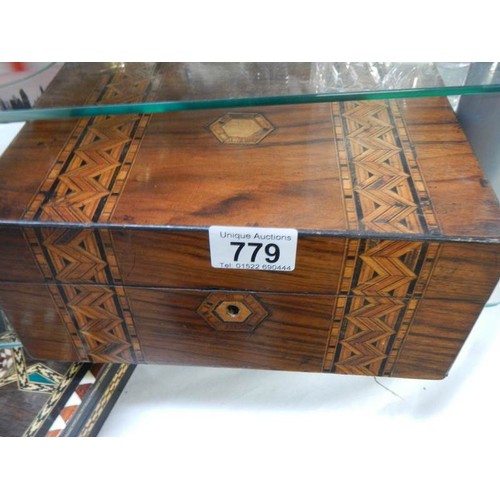 779 - Three mahogany boxes including inlaid examples.