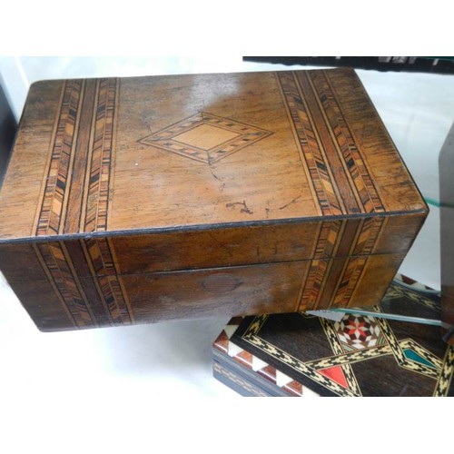 779 - Three mahogany boxes including inlaid examples.