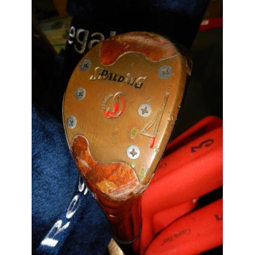 600C - A set of Regal Wild Thing Golf clubs in bag with trolley and many balls, COLLECT ONLY.