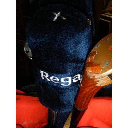 600C - A set of Regal Wild Thing Golf clubs in bag with trolley and many balls, COLLECT ONLY.