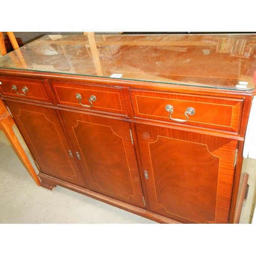 819 - A circa 1970's 4 door 3 drawer glass top sideboard, COLLECT ONLY.