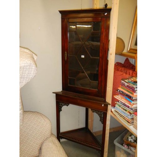 827 - A Victorian mahogany astragal glazed corner cabinet on stand, COLLECT ONLY.