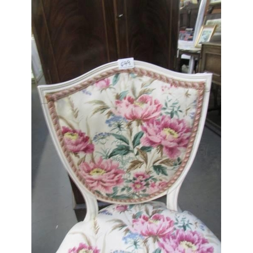 679 - A white painted and upholstered French style chair, COLLECT ONLY.