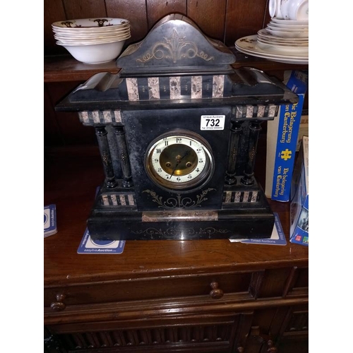 732 - An old slate mantel clock, springs ok.