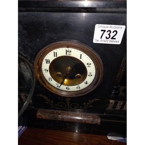 732 - An old slate mantel clock, springs ok.