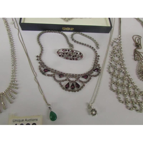 1028 - A good lot of diamonte' and other necklaces.