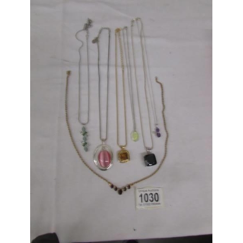 1030 - Six pretty pendants and a necklace.