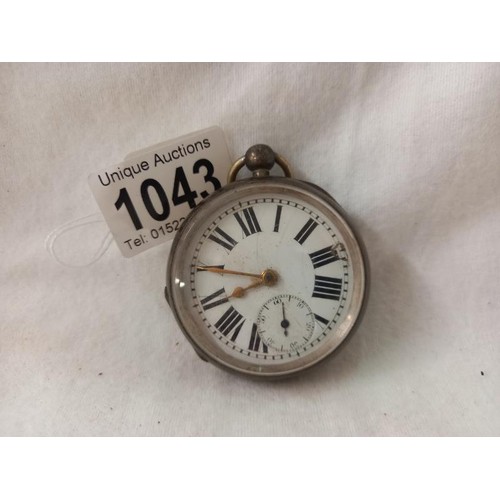 1043 - A Swiss made silver pocket watch.