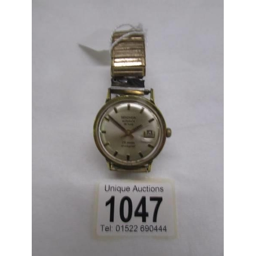 1047 - A mid 20th century Sekonda auto date deluxe 29 jewel shockproof gent's wrist watch.