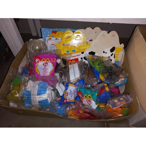 100 - A large lot of McDonalds toys still in bags, from the 90'sand 2000's, may have some complete lots in... 