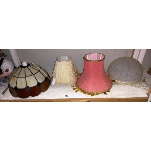 112 - A leaded glass lampshade and 1 other and 2 vintage fabric shades