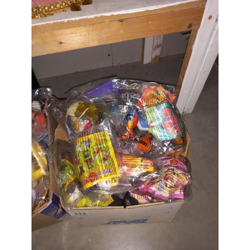 113 - A large lot of McDonalds toys still in bags, from the 90'sand 2000's, may have some complete lots in... 