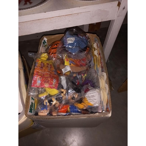 122 - A large lot of McDonalds toys still in bags, from the 90'sand 2000's, may have some complete lots in... 