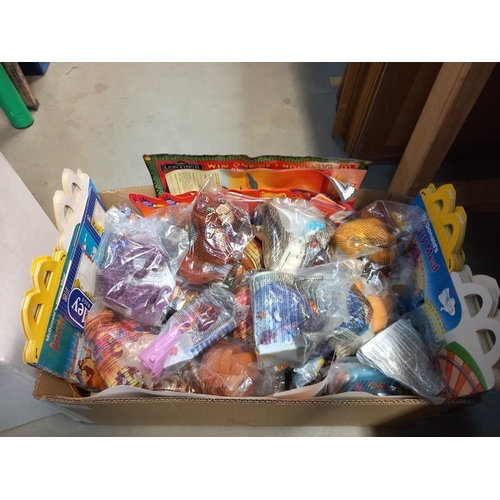 16 - A large lot of McDonalds toys still in bags, from the 90'sand 2000's, may have some complete lots in... 