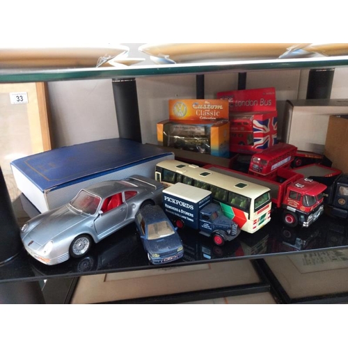 30 - A quantity of Die cast cars etc.