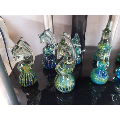 40 - Ten Mdina glass seahorse paperweights, various sizes.