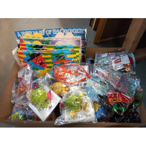 8 - A large lot of McDonalds toys still in bags, from the 90's and 2000's, may have some complete lots i... 
