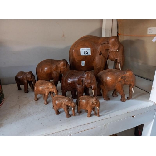 95 - 8 wooden elephant ornaments