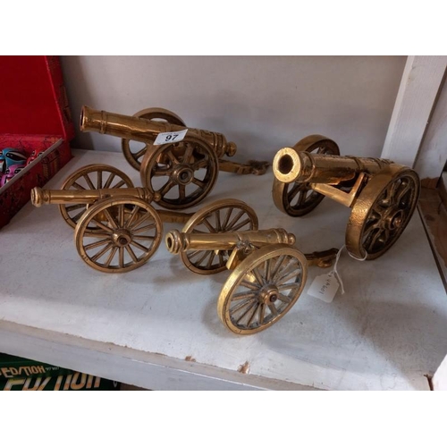 97 - Two pairs of solid brass cannons.