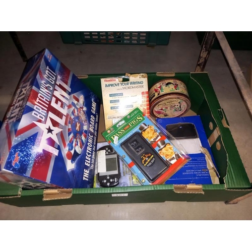 151 - A quantity of miscellaneous electric & board games including Britain's got talent & Sudoku etc