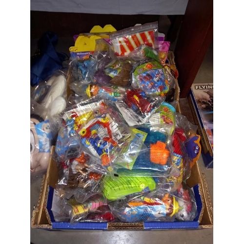 157 - A mixed lot of McDonalds toys including Tweenies, Action Man & Bill & Ben plus happy meal boxes etc.