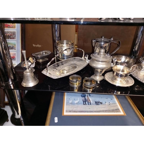 160 - 3 silver plated tea sets, small Russian samovar, cruets etc. 2 shelves