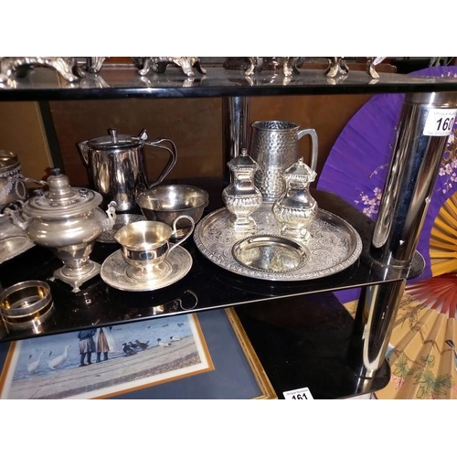 160 - 3 silver plated tea sets, small Russian samovar, cruets etc. 2 shelves