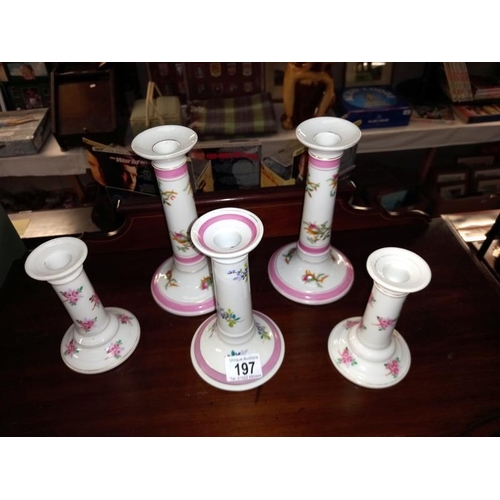 197 - 2 pairs and 1 other, 19th/20th Century continental pottery candlesticks