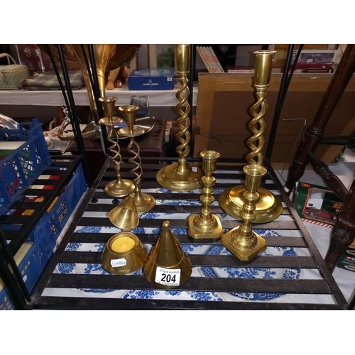 204 - 3 pairs of brass candlesticks and 1 other