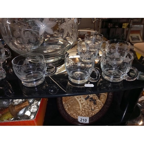 208 - A punch bowl, ladle & 11 glasses/cups. Collect Only.