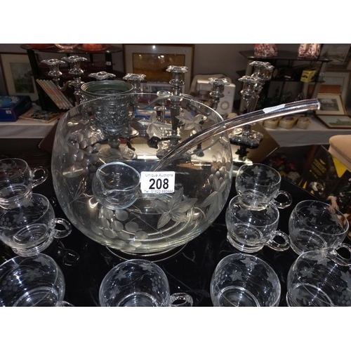 208 - A punch bowl, ladle & 11 glasses/cups. Collect Only.