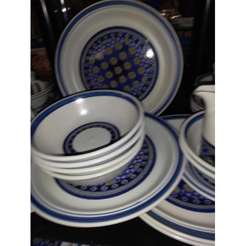 211 - Approximately 36 pieces of Royal Doulton tangier dinner and tea ware.