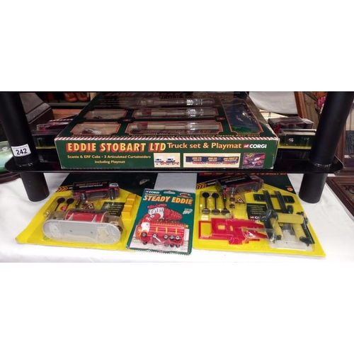 242 - A Corgi 60008 Eddie Stobart truck set and play mat and 5 others.