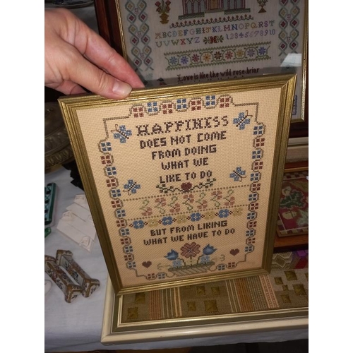 246 - A large framed sampler dated 2004 and 3 others.