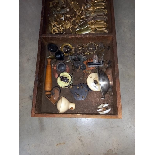 292 - A quantity of vintage sash window pulley wheels & brass plated hooks etc.