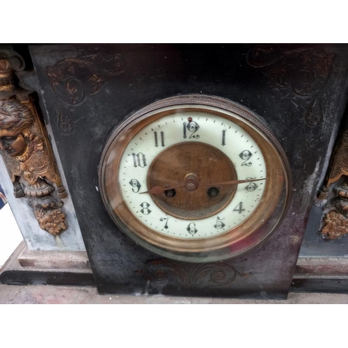 302 - A large black slate mantle clock with brass ormolu embellishments, no key, no pendulum, no movement ... 