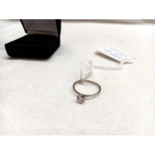 1054 - A diamond ring, single stone set in 18ct white gold with a diamond report certificate.