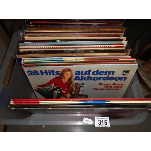 315 - A selection of 33rpm, LP vinyl records, German and big bands etc.