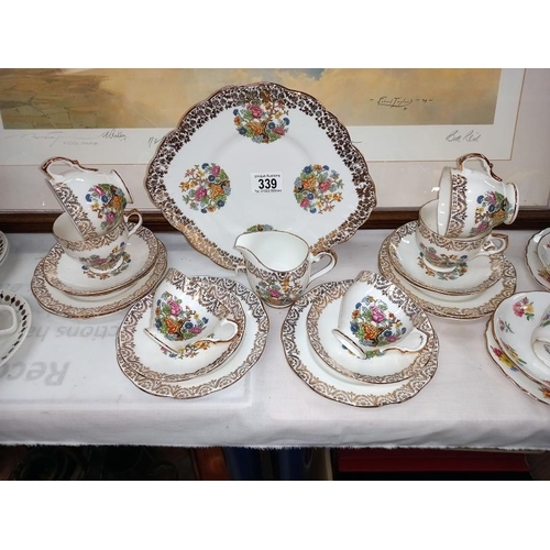 339 - An imperial crown China tea set, 2 trios and 10 piece coffee set.