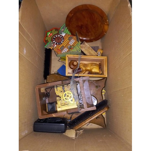 617 - A box of clock parts.