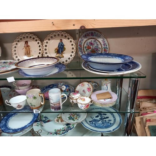 551 - Three shelves of ceramics including Chinese plates.